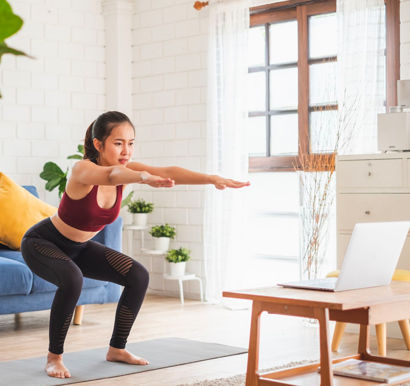 Women working out at home using tribe on-demand
